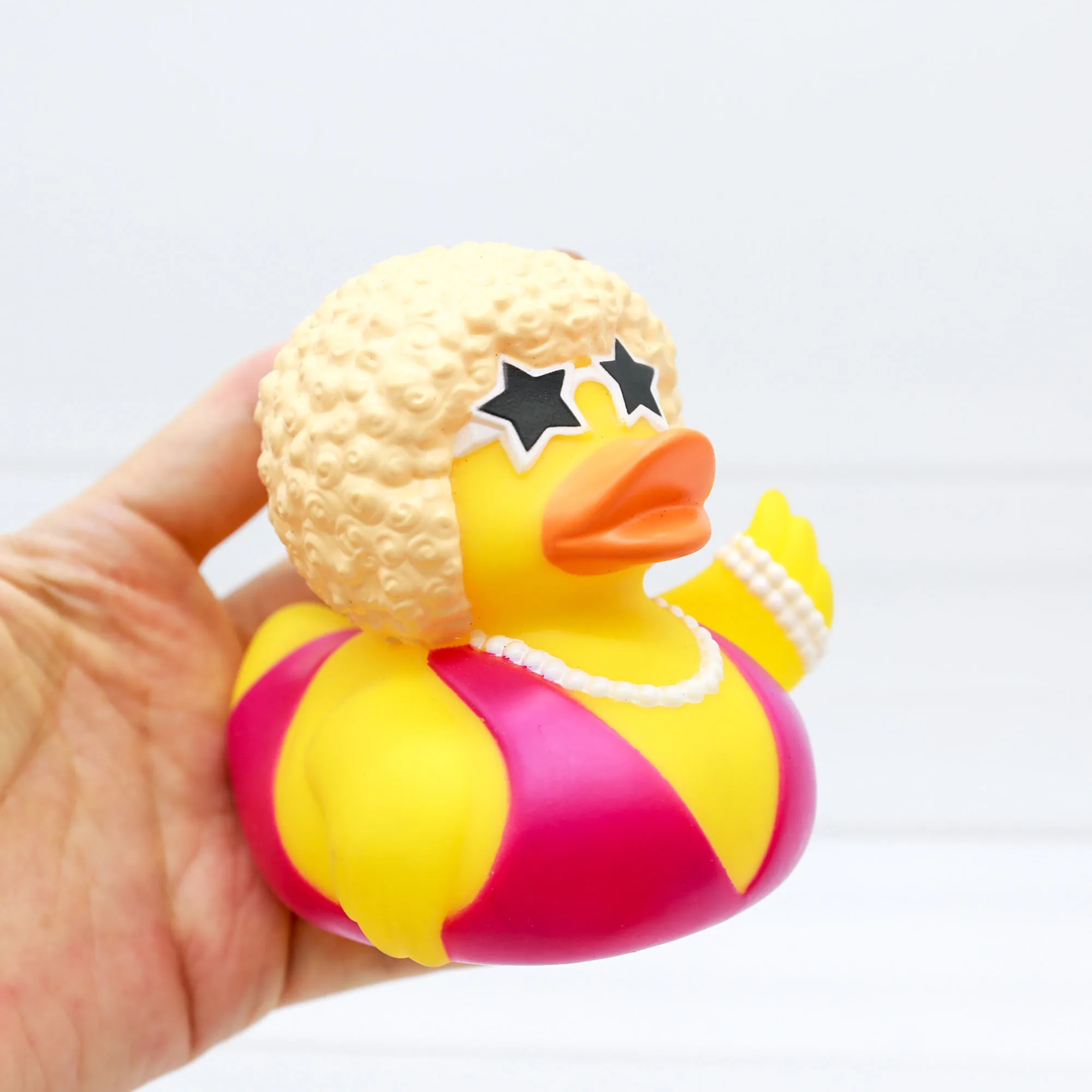 دمية شخصية كرتونية على شكل بطة - مراجعة Vinyl Figure Blank وسعره