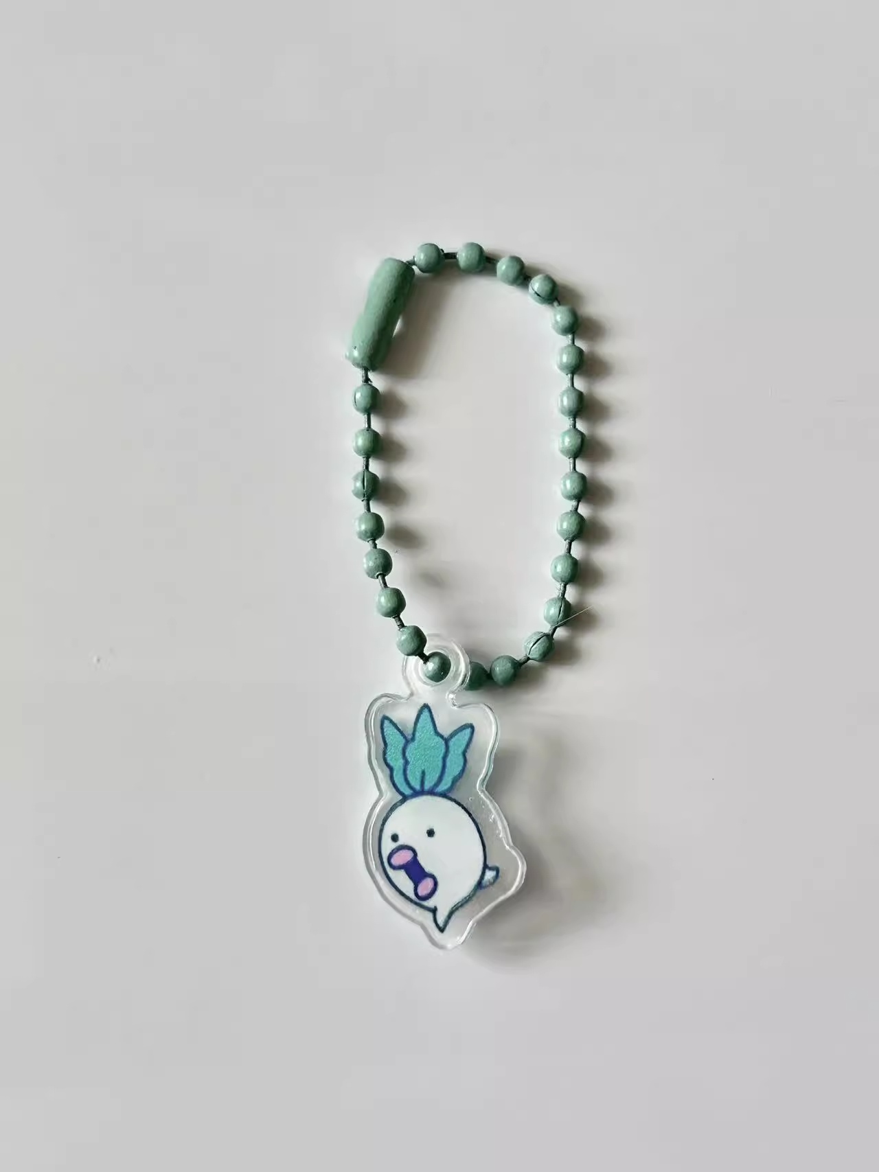سلسلة معلقة صغيرة أصلية من Tam - مراجعة Bandai Model Tamagotchi وسعره